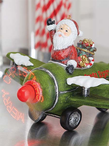 raz imports ANIMATED MUSICAL SANTA IN PLANE